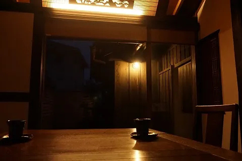 a traditional Japanese inn's dining room at night